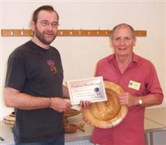The monthly winner Howard Overton received his certificate from Mark Hancock